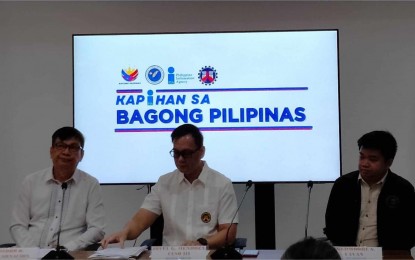 <p><strong>REOPENED ROADS</strong>. Jovel Mendoza (center), Department of Public Works and Highways (DPWH) director in Calabarzon, on Tuesday (May 28, 2024) reported about the damage caused by Typhoon Aghon on the region's roads. This took place during the launch of the "Kapihan sa Bagong Pilipinas" media forum that is being spearheaded by the Presidential Communications Office under the management of the Philippine Information Agency. <em>(Photo by Zen Trinidad)</em></p>