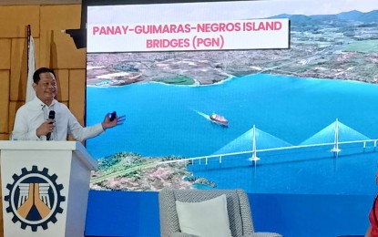 <p><strong>SEAMLESS TRAVEL.</strong> DPWH regional director engineer Sanny Boy Oropel gives an update on the PHP187.54-billion mega Panay-Guimaras-Negros bridges project during the Bagong Pilipinas town hall meeting at the DPWH regional office in Iloilo City on Tuesday (May 28, 2024). He said the Panay to Guimaras section will be delivered by the end of President Ferdinand R. Marcos Jr.’s term on June 30, 2028. <em>(PNA photo by Perla G. Lena)</em></p>