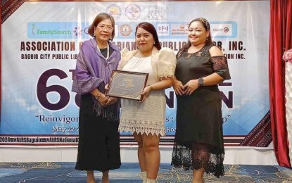 <p><strong>CONVENTION OF LIBRARIANS</strong>. Negros Occidental Provincial Librarian II Rio Lynne Panisa (center), with Provincial Librarian I Raia Tiongson, receives a certificate of participation from Association of Librarians in the Public Sector president Lucila Raquiño (left), during the ALPS 6th National Convention held in Baguio City on May 23, 2024. During the event, the Negros Occidental Provincial Library, Silay City Public Library, and Himamaylan City Public Library were each awarded PHP100,000 worth of electronic (e)-books for one year. <em>(Photo courtesy of Provincial Library of Negros Occidental)</em></p>