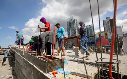 <p><strong>REHAB.</strong> Infrastructure works are in full swing in Intramuros, Manila in this May 23, 2024 photo, which is part of the “Pasig Bigyang Buhay Muli: Pasig River Urban Development Showcase Area” that aims to restore the glory of the 25.2-kilometer water body that connects Laguna de Bay to Manila Bay. The Department of Budget and Management (DBM) on Wednesday (Oct. 9) expressed optimism about more private investments for the development of the infrastructure sector. <em>(PNA file photo by Yancy Lim)</em></p>