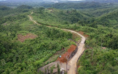 <p><strong>NEW LINK</strong>. A portion of the newly concreted road in Basey, Samar leading to Maydolong, Eastern Samar. Logging roads will be used in the ongoing construction of the PHP3.31 billion Basey-Maydolong Road to reduce the number of trees that will be uprooted in the construction of a new highway meant to link this city to Borongan, the capital of Eastern Samar province<em>. (Photo courtesy of DPWH Region 8)</em></p>