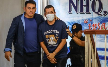 <p><strong>TRIGGERMAN</strong>. Gerard Raymund Yu, 34-year-old suspect in the fatal road rage on the southbound lane of the EDSA-Ayala Avenue tunnel, Makati City, arrives at Camp Crame, Quezon City on Wednesday (May 29, 2024). Yu, driving a Mercedes-Benz, shot dead a 65-year-old family driver who was in a Toyota Innova bound for Alabang with a woman and child on May 28. <em>(PNA photo by Joan Bondoc)</em></p>
