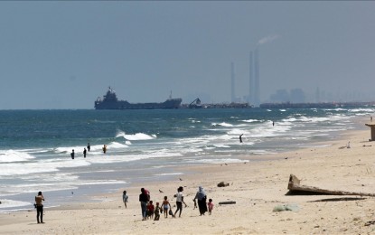 <p><strong>AID SUSPENSION</strong>. United States Navy ships anchor off the coast of Gaza to operate for floating pier project in Gaza on May 16, 2024. Deliveries of aid are, however, suspended after the pier was damaged by bad weather. <em>(Photo by Anadolu)</em></p>