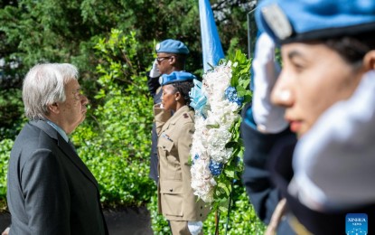 <p><strong>IN REMEMBRANCE</strong>. UN Secretary-General Antonio Guterres (left) attends a wreath laying ceremony at the UN headquarters in New York, on Thursday (May 30, 2024). The world body on Thursday held events at its headquarters in New York to honor the memory of the UN peacekeepers who lost their lives since 1948. <em>(Mark Garten/UN Photo/Handout via Xinhua)</em></p>