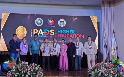 <p><strong>AWARD</strong>. University of Antique (UA) president Dr. Pablo Crespo, Jr. (4th from left) receives the Philippine Anti-Illegal Drugs Strategy (PADS) Innovative Awards in a ceremony at the Commission on Higher Education (CHED) Auditorium in Diliman, Quezon City on May 17, 2024. Crespo, in an interview Wednesday (June 5, 2024), said they would integrate drug education and prevention into its instructional materials next school year. <em>(Photo courtesy of University of Antique)</em></p>