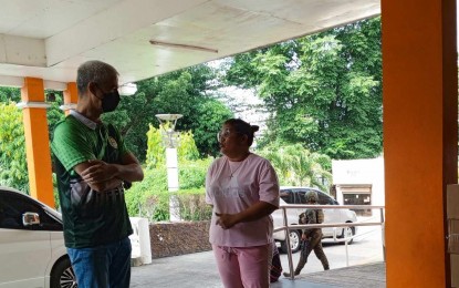 <p><strong>VISIT.</strong> Negros Occidental Governor Eugenio Jose Lacson (left) meets with Mayor Rhummyla Nicor-Mangilimutan at the La Castellana municipal hall Wednesday morning (June 5, 2024). The provincial government has provided relief supplies to the central Negros town after the eruption of Mt. Kanlaon Monday night (June 3). <em>(Photo courtesy of PIO Negros Occidental</em>)</p>