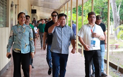 <p><strong>OCULAR INSPECTION</strong>. Dumaguete City Mayor Felipe Antonio Remollo (center) and Department of Education 7 (Central Visayas) Director Salustiano Jimenez (right) inspect the new site for two public schools in Dumaguete, Negros Oriental on Thursday (June 6, 2024). The city government formally turned over the former Catherina Cittadini - St. Louis School, which it acquired recently, to DepEd officials also on Thursday. <em>(Photo courtesy of Lupad Dumaguete Facebook)</em></p>