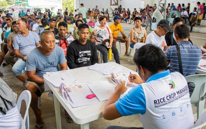 <p><strong>FERTILIZER VOUCHERS.</strong> Over 2,000 rice farmers from 35 barangays in Butuan City receive their fertilizer and seed vouchers on Thursday, (June 7, 2024) in a series of distribution activities conducted by the Department of Agriculture in the Caraga Region (DA-13) under the DA-Masagana Rice Industry Development Program. The program has a total allocation of PHP525 million, benefiting 137,363 rice farmers in Caraga Region. <em>(Photo courtesy of DA-13)</em></p>
<p> </p>