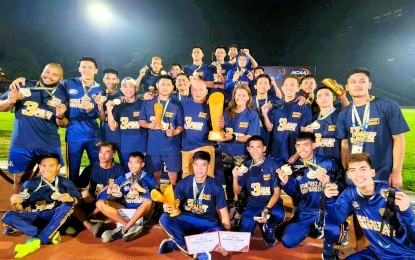 <p><strong>CHAMPS AGAIN.</strong> Jose Rizal University pockets its third straight title and 10th overall at the close of the NCAA Season 99 track and field competition at PhilSports in Pasig City on Saturday (June 8, 2024). Southeast Asian Games relay champion Frederick Ramirez (seated, center) led the team with three gold medals. <em>(NCAA photo)</em></p>