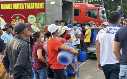 <p><strong>DISTRIBUTION.</strong> Residents of Canlaon City, Negros Oriental line up at a portable/mobile water filtration system to access safe drinking water in this undated photo. Following the June 3, 2024 eruption of Mt. Kanlaon, water sources in the mountain city may have been compromised by the presence of hazardous sulfur dioxide. <em>(Photo courtesy of Salta Canlaon Official Facebook) </em></p>