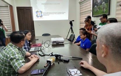 <p><strong>MT. KANLAON UPDATE. </strong>Philippine Institute of Volcanology and Seismology Director Teresito Bacolcol (left) and chief science research specialist Ma. Antonia Bornas (2nd from left) meet with Negros Occidental Governor Eugenio Jose Lacson at the Provincial Capitol in Bacolod City Monday afternoon (June 10, 2024). They presented the latest updates on the Mt. Kanlaon eruption and advised local government units to prepare contingency plans as the threat of magmatic eruption continues. (<em>PNA photo by Nanette L. Guadalquiver)</em></p>