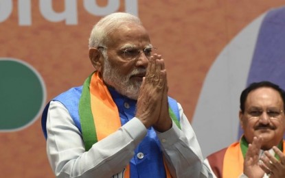 India's Modi keeps key ministers, indicating policy continuity