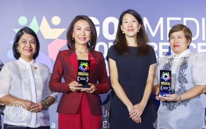 <p><strong>RECOGNITION.</strong> Tourism Secretary Christina Garcia Frasco (2nd from left), DOT – Office of Industry Manpower Development OIC-Director Arlene A. Alipio (left), and Tourism Infrastructure and Enterprise Zone Authority Assistant Chief Operating Officer Joy Bulauitan (right) show the awards presented at the GovMedia Conference & Awards 2024 in Singapore on Thursday (June 13, 2024). The Department of Tourism was recognized for its Tourist Rest Area and the Filipino Brand of Service Excellence training program. <em>(Photo courtesy of DOT)</em></p>
