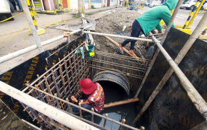 <p><strong>EXPEDITED WORK.</strong> Personnel of the Department of Public Works and Highways work on a drainage project along Legaspi Street, Poblacion District in Davao City on Thursday (June 13, 2024). The 20th City Council passed a resolution on June 11, demanding the DPWH to expedite unfinished road repair and other infrastructure projects in the city to prevent these from hindering traffic.<em> (PNA photo by Robinson Niñal Jr.)</em></p>