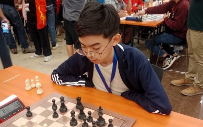 <p><strong>CHESS CHAMP. </strong>FIDE Master Ivan Travis Cu competes in the open division of the JCI Senate Lipa Open Rapid chess team tournament at the Lipa City Convention Center on Monday (June 17, 2024). Cu led Team Seirin to victory. <em>(Contributed photo) </em></p>