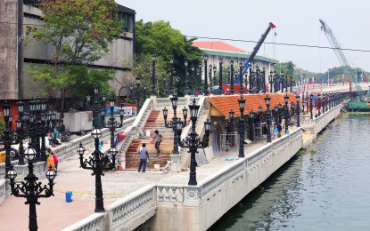 <p><strong>PASIG RIVER REHAB</strong>. Infrastructure works are in full swing in Intramuros, Manila on Thursday (June 13, 2024) as part of the “Pasig Bigyang Buhay Muli: Pasig River Urban Development Showcase Area,” which aims to restore the glory of the 25.2-km. body of water that connects Laguna de Bay to Manila Bay. The project, under the guidance of First Lady Liza Araneta-Marcos, envisions a living river with safe walkways and bikeways along its banks, with greener surroundings, urban gardens, parks, commercial enterprises, and even regular transportation. <em>(PNA photo by Yancy Lim)</em></p>