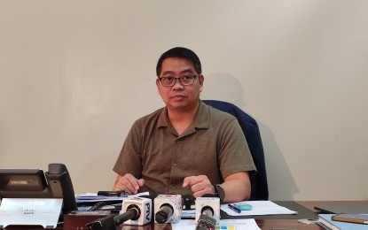 <p><strong>CHEAP RICE.</strong> Agriculture Assistant Secretary Arnel de Mesa says they are finalizing the mechanics of the Bigas 29 program, during an interview at the DA main office along Elliptical Road in Quezon City on Thursday (June 20, 2024). The program seeks to sell rice at PHP29 per kg. to the vulnerable sectors of society, which include beneficiaries of the Pantawid Pamilyang Pilipino Program, persons with disability, solo parents, and senior citizens. <em>(PNA photo by Stephanie Sevillano)</em></p>
