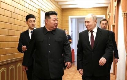 <p><strong>STRENGTHENING TIES.</strong> Russian President Vladimir Putin meets with Chairman of State Affairs of the Democratic People's Republic of Korea Kim Jong-un upon his invitation in Pyongyang, North Korea on June 18, 2024. Russia and North Korea, under a new agreement, made a commitment to help each other in the event of aggression against either country, Putin said on Wednesday (June 19, 2024).<em> (Anadolu photo)</em></p>
