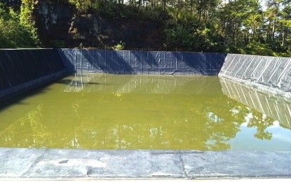<p><strong>FILLING UP</strong>. Construction of the 46,000 cubic-meter water harvesting facility in Baguio City is about 97 percent complete and is now on the testing stage. Once fully operational and filled to its full capacity, the project will ensure continued supply of potable water to more than 2,000 water connections in 16 villages of the city’s Aurora Hill and Pacdal areas. <em>(PNA photo by Liza T. Agoot)</em></p>