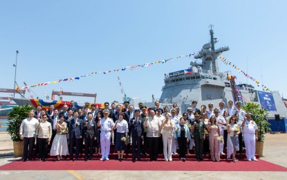 <p><strong>MISSILE CORVETTE.</strong> Officials of the Department of National Defense (DND) led by Secretary Gilberto Teodoro Jr. and the Armed Forces of the Philippines and South Korean shipbuilder Hyundai Heavy Industries grace the launch of Manila's first guided missile corvette in Ulsan, South Korea on June 18, 2024. The DND on Friday (June 21) said the missile corvette was named the BRP Miguel Malvar (FF-06). <em>(Photo courtesy of DND)</em></p>