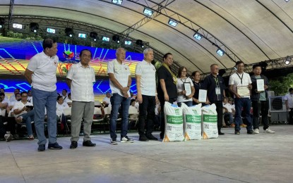 <p><strong>SERBISYO FAIR REACHES SURIGAO DEL SUR.</strong> House Speaker Ferdinand Martin G. Romualdez (5th from left) leads the distribution of government assistance to beneficiaries of the Bagong Pilipinas Serbisyo Fair at the De La Salle John Bosco College-Open Field, in Baslig City, Surigao del Sur on Friday (June 21, 2024). More than 90,00 beneficiaries received government services, as well as cash, education and livelihood assistance worth more than PHP560 million in the 9th BPSF in Mindanao, and the 20th installment in the whole country. <em>(Photo courtesy of Speaker Romualdez's office)</em></p>