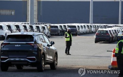<p><strong>RECORD HIGH.</strong> Cars awaiting shipment overseas at a port in the southwestern city of Mokpo on Dec. 7, 2022. South Korea's car exports are forecast to reach a record high this year, driven by solid demand for eco-friendly models and sport utility vehicles, the Korea Automobile and Mobility Association said Sunday (June 21, 2024). <em>(Yonhap)</em></p>