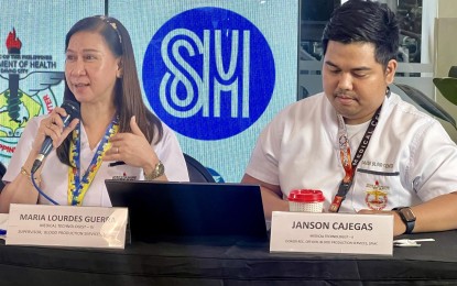 <p><strong>BLOOD DONATION</strong>. Maria Lourdes Guerra (left) and Janson Cajegas, both medical technologists from the Southern Philippines Medical Center's (SPMC) Blood Production Services, urge Davao City residents on Monday (June 24, 2024) to participate in blood donation drives in their communities. At least 100 whole blood units are needed daily for the patients at the SPMC alone. <em>(PNA photo by Che Palicte)</em></p>