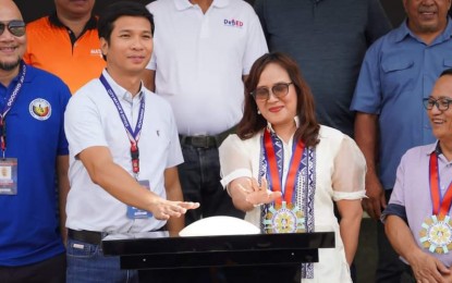 <p><strong>NEW CONNECTIONS.</strong> Mayor Erick Cañosa (center, left) and Sittie Rahma Alawi (center, right), director of the Department of Information and Communications Technology in Region 10, launch the free wireless fidelity (Wi-Fi) hotspots in Gingoog City, Misamis Oriental, on Monday (June 24, 2024). The activity is in line with the ICT Month celebration.<em> (Photo courtesy of Gingoog CIO)</em></p>