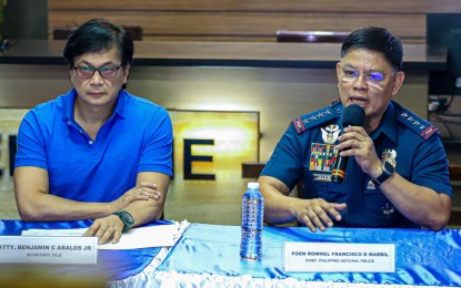 <p><strong>POGO PROBE.</strong> PNP chief Gen. Rommel Marbil (right) and Interior Secretary Benjamin Abalos Jr. hold a press briefing at Camp Crame, Quezon City on Monday (June 24, 2024). Marbil said Police Regional Office (PRO)-3 (Central Luzon) chief Brig. Gen. Jose Hidalgo Jr. is under investigation for his accountability over the illegal Philippine offshore gaming operators in the provinces of Pampanga and Tarlac. <em>(PNA photo by Robert Oswald P. Alfiler)</em></p>