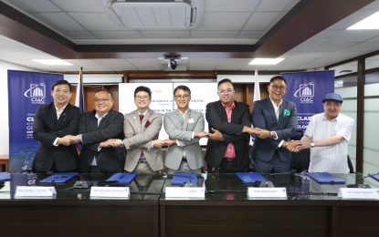 <p><strong>MODERN FOOD HUB</strong>. CIAC president Arrey Perez (4th from left) and World Food Chain Pte. Ltd. chairperson and chief executive officer Jeremy Nathaniel Gohkongwei (3rd from left) lead the signing of a memorandum of understanding for the National Food Hub on June 19, 2024 at CIAC's Board Room in Clark Aviation Complex in Clark Freeport Zone, Pampanga. The private sector will provide technical and advisory assistance to CIAC for the proposed National Food Hub. <em>(Courtesy of CIAC)</em></p>