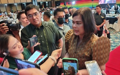 <p><strong>SPECIAL VISIT.</strong> Vice President Sara Duterte (right) talks to the media in Cagayan de Oro City on Tuesday (June 25, 2024). Duterte's office distributed PHP300,000 worth of grants to lesbian, gay, bisexual, transgender and queer plus community members in order to improve their entrepreneurial ventures.<em> (PNA photo by Ercel Maandig)</em></p>