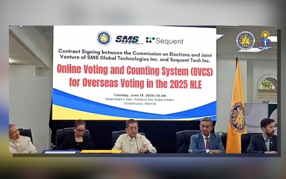 <p><strong>OVERSEAS VOTING PROJECT.</strong> Officials of the Commission on Elections (Comelec) led by chairperson George Erwin Garcia (center) and the joint venture of SMS Global Technologies, Inc. (SMS) and Sequent Tech Inc. hold a press briefing at the Comelec main office in Intramuros, Manila on Tuesday (June 25, 2024). The two institutions signed the contract for the the contract signing for the Online Voting and Counting System, to be used by overseas voters in the 2025 midterm polls. <em>(Screengrab from Comelec Facebook)</em></p>
