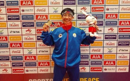 <p><strong>HOPEFUL</strong>. Marianne Mariano holds the silver medal she won in the women's 55kg category in kun bukator, an ancient martial art in Cambodia, during the Southeast Asian Games last year. She is eyeing for a gold medal in the Asia-Oceania Sambo Championships on June 29-30, 2024 in Macau. <em>(Contributed photo) </em></p>