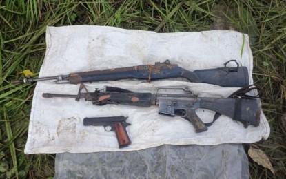 <p><strong>RECOVERED</strong>. The firearms and ammunition recovered on Thursday (June 27, 2024) after an encounter between government soldiers and New People's Army members in Barangay Malbang, Pantabangan town in Nueva Ecija the day before. The Philippine Army's 84th Infantry Battalion also found three bodies of female rebels in the encounter site. <em>(Photo courtesy of Philippine Army)</em></p>