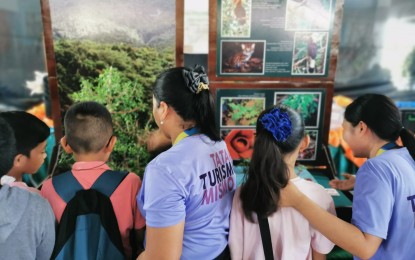 <p><strong>TRAVELING MUSEUM.</strong> Learners view some of the exhibits during the Pambansang Museo sa Barangay (PMB) in Barangay Hibao-an Norte in Iloilo City in April 2024. The National Museum of the Philippines Iloilo hoped to raise public awareness and inspire appreciation of Filipino heritage through the PMB. <em>(Photo courtesy of NMP Iloilo)</em> </p>