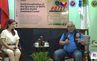 <p><strong>DOH-7 HOTLINE</strong>. Department of Health (DOH)-Central Visayas regional director Jaime Bernadas (right) underscores the institutionalization of #711 hotline for faster and easy referral of patients as Philippine Information Agency Region 7 (PIA-7) head Fayette Riñen listens, during the Bagong Pilipinas forum on Tuesday (July 2, 2024) at the PIA's regional field office in Cebu City. Established during the Covid-19 pandemic, the hotline connects patients to a call center operator 24/7 and to the One Command Health Center for electronic referral to a hospital. <em>(Contributed photo)</em></p>