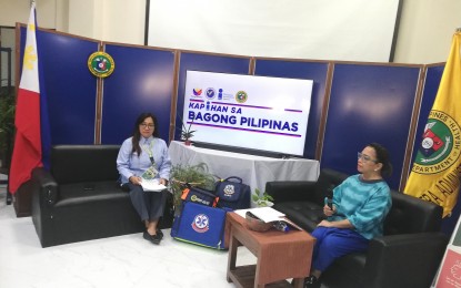 <p><strong>PUBLIC-PRIVATE PARTNERSHIP</strong>. The Department of Health in the Cordillera hopes to address the gap in the number of immunized children through a partnership with the Philippine Pediatric Society. Dr. Janice Bugtong (left), assistant regional director of the DOH-CAR, during the Bagong Pilipinas (New Philippines) press briefing in Baguio City on Tuesday (July 2, 2024), said the tie-up will allow health authorities to get data from private medical practitioners to determine the gap on immunization rate among children aged zero to five years. <em>(PNA photo by Liza T. Agoot)</em></p>