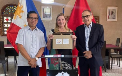 <p><strong>DONATION.</strong> Philippine Ambassador Leslie J. Baja, Education for All (EFA) Treasurer Juanita Folmsbee, and British Ambassador Simon Martin (left to right) during the turnover ceremony of a donation to EFA at the Chancery on Thursday (July 4, 2024). The Philippine Embassy in Morocco donated 18,000 Moroccan dirhams (approximately USD1,800) to the Moroccan non-government organization. <em>(Photo courtesy of the Philippine Embassy in Morocco)</em></p>