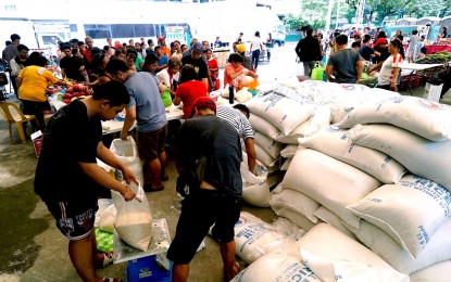 <p style="text-align: left;"><strong>CONTINUOUS OPERATIONS.</strong> Members of the vulnerable sector buy rice at PHP29 per kilogram at a Kadiwa site in Quezon City on June 8, 2024. The Department of Agriculture on Thursday (July 25,) assured that operations of the P29 program will resume at six Kadiwa sites unaffected by floods brought by the enhanced southwest monsoon. <em>(PNA file photo by Ben Briones)</em></p>