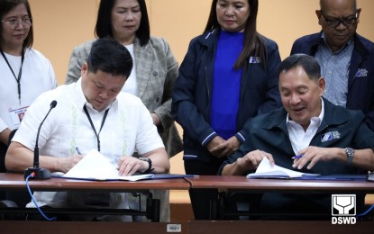 <p><strong>SSS MEMBERSHIP</strong>. Department of Social Welfare and Development (DSWD) Secretary Rex Gatchalian (left) and Social Security System (SSS) President and CEO Rolando Macasaet sign the memorandum of agreement (MOA) for a low-cost insurance program for beneficiaries of the Pantawid Pamilyang Pilipino Program (4Ps) at the DSWD Auditorium in Central Office, Quezon City on Monday (July 8, 2024 ). The MOA outlines the commitment of the DSWD to ensure that 4Ps beneficiaries are educated on the importance and benefits of the SSS membership and savings scheme. <em>(Photo courtesy of DSWD)</em></p>