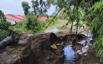 <p><strong>FLASHFLOOD.</strong> A portion of the excavated box culvert at the back of the National Housing Authority (NHA) resettlement site in the Municipality of Laua-an in this photo on Monday (July 8, 2024).  Occupants of the resettlement site are advised to move to safer places following a flash flood that affected the relocation area on Sunday (July 7). <em>(Photo courtesy of Antique PHARO)</em></p>