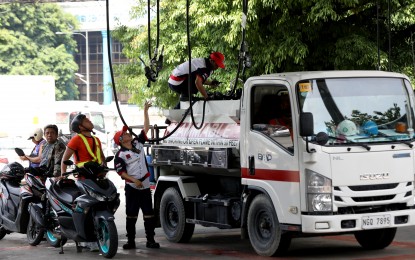 <p><strong>CLIMBING PRICES.</strong> A truck refuels at a gasoline station in Intramuros, Manila in this photo taken on July 9, 2024. Oil firms announced a big-time hike in fuel prices to take effect on Tuesday (Oct. 15, 2024). <em>(PNA file photo by Yancy Lim)</em></p>