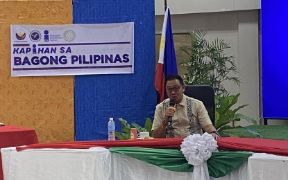 <p><strong>TOURISM PROMOTION</strong>. Department of Tourism (DOT)-Bicol Regional Director Herbie Aguas reports on the programs and accomplishments of their office to promote the tourism industry in the six provinces of the region during the "Kapihan sa Bagong Pilipinas" at the Department of Public Works and Highways conference hall in Legazpi City on Tuesday (July 9, 2024). He said DOT-Bicol has started promoting golf and dive tourism in the region. <em>(PNA photo by Connie Calipay)</em></p>