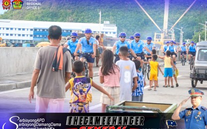 <p><strong>POLICE VISIBILITY</strong>. Personnel of the Police Regional Office in Bicol (PRO5) conduct bike patrol along Legazpi City Boulevard in this undated photo. PRO5 arrested 2,590 wanted persons and 77 New People’s Army members from January to June this year, it said Thursday (July 11, 2024). <em>(Photo from Brig. Gen. Dizon’s Facebook page)</em></p>