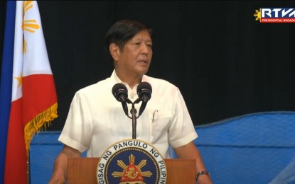 <p><strong>RURAL DEV’T PLAN</strong>. President Ferdinand R. Marcos Jr. delivers his speech during the distribution of presidential assistance to farmers and fisherfolk affected by the El Niño phenomenon at the Fernando Poe Jr. Arena in San Jose, Batangas on Thursday (July 11, 2024). Marcos said the government has set aside nearly PHP10 billion for the Philippine Rural Development Plan in Calabarzon (Region 4-A) to stimulate economic development in the area. <em>(Screengrab from RTVM)</em></p>