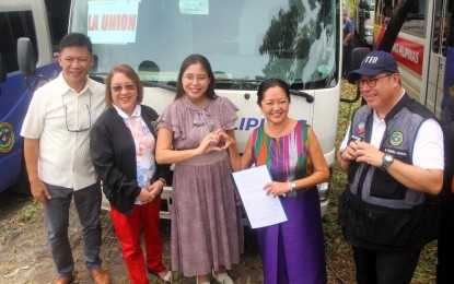 <p><strong>DISTRIBUTION</strong>. First Lady Liza Araneta-Marcos (4th from left), Health Secretary Teodoro Herbosa (rightmost) and La Union Governor Raphaelle Veronica Ortega-David (middle) pose with other Department of Health officials in front of the Bagong Pilipinas Mobile Clinic during its distribution on Wednesday (July 10, 2024) at the Clark Freeport Zone in Pampanga. Distribution of the mobile clinic is part of the First Lady’s Lab for All Project. <em>(Photo courtesy of DOH Ilocos)</em></p>