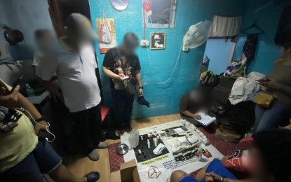 <p><strong>BUY-BUST.</strong> Anti-narcotics police officers account for evidence in a drug buy-bust operation in Barangay 201 in the early hours of Friday (July 12, 2024). Two suspects were arrested in the operation. <em>(Photo courtesy of PDEG)</em></p>