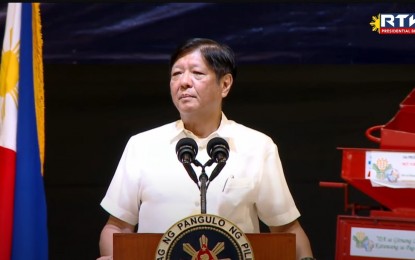 <p><strong>BALER AIRPORT</strong>. President Ferdinand R. Marcos Jr. delivers his speech during the distribution of presidential assistance to farmers and fisherfolk at the Senator Edgardo J. Angara Convention Center in Baler, Aurora on Friday (July 12, 2024). Marcos said the Baler Airport would be developed to increase its capacity to accommodate more flights and passengers. <em>(Screengrab from RTVM)</em></p>
<p><em> </em></p>