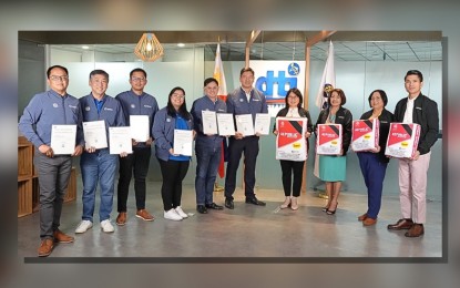 <p><strong>TATAK PINOY</strong>. Department of Trade and Industry's (DTI) Competitiveness and Innovation Group Undersecretary Rafaelita Aldaba (4th from right), Director Lilian Salonga (3rd from right), Division Chief Sheryl Santos (2nd from right), and Assistant Director Jo-Dann Darong (rightmost) lead the DTI's awarding of Domestic Bidder’s Certificate of Preference to Republic Cement at the DTI Office in Makati City on July 4, 2024. Republic Cement was represented by Gerry Pinlac, Frankie Tan, Rowland Mercado, Antonette Nicolas, PV Aquino, and Reinier Dizon. <em>(Courtesy of DTI)</em></p>