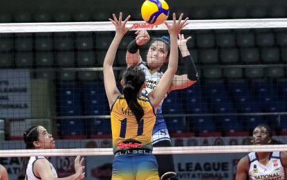 <p><strong>INVITATIONALS</strong>. National University's Sheena Toring (No. 8) scores against University of Southern Philippines Foundation's Dya Hanica Mejos during the quarterfinals of the Shakey’s Super League National Invitationals at Ninoy Aquino Stadium in Manila on Saturday (July 13, 2024). NU won, 25-11, 25-12, 25-14, to make the Final Four against Letran.<em> (Contributed photo)</em></p>